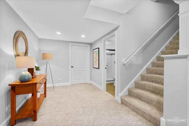 a en suite bathroom with a sink a mirror and a shower