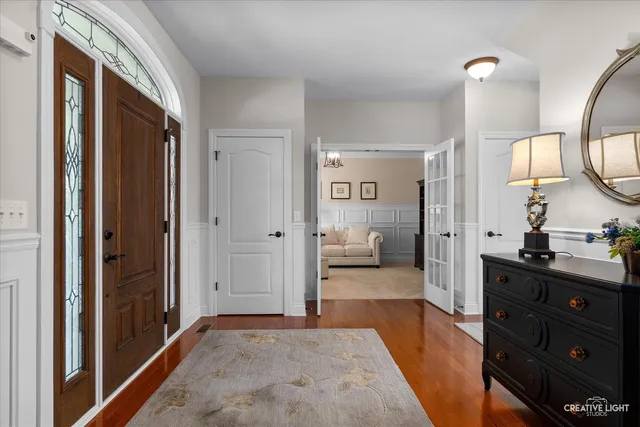 a view of a swimming pool and front of house