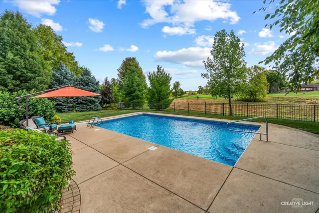 a view of a city with lawn chairs