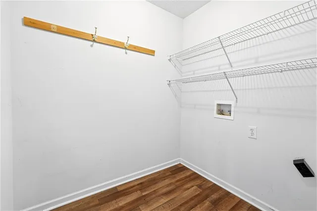 a view of a room with racks on the wall