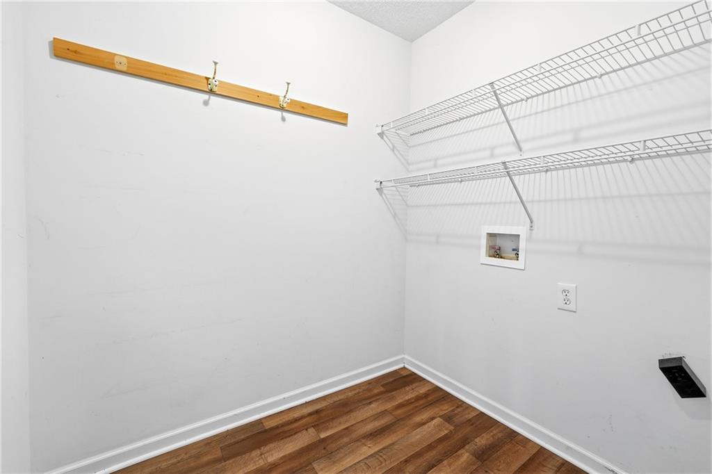 186 Franklin Court Jasper, GA 30143 - Photo 22 of 30 a view of a room with racks on the wall