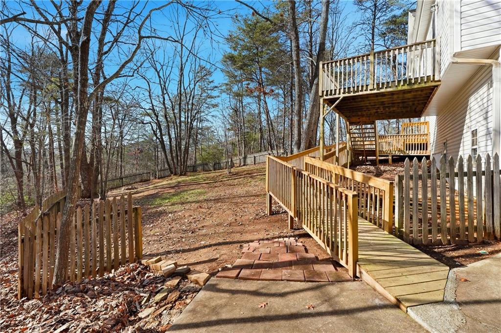 186 Franklin Court Jasper, GA 30143 - Photo 25 of 30 a view of street with wooden stairs and large trees