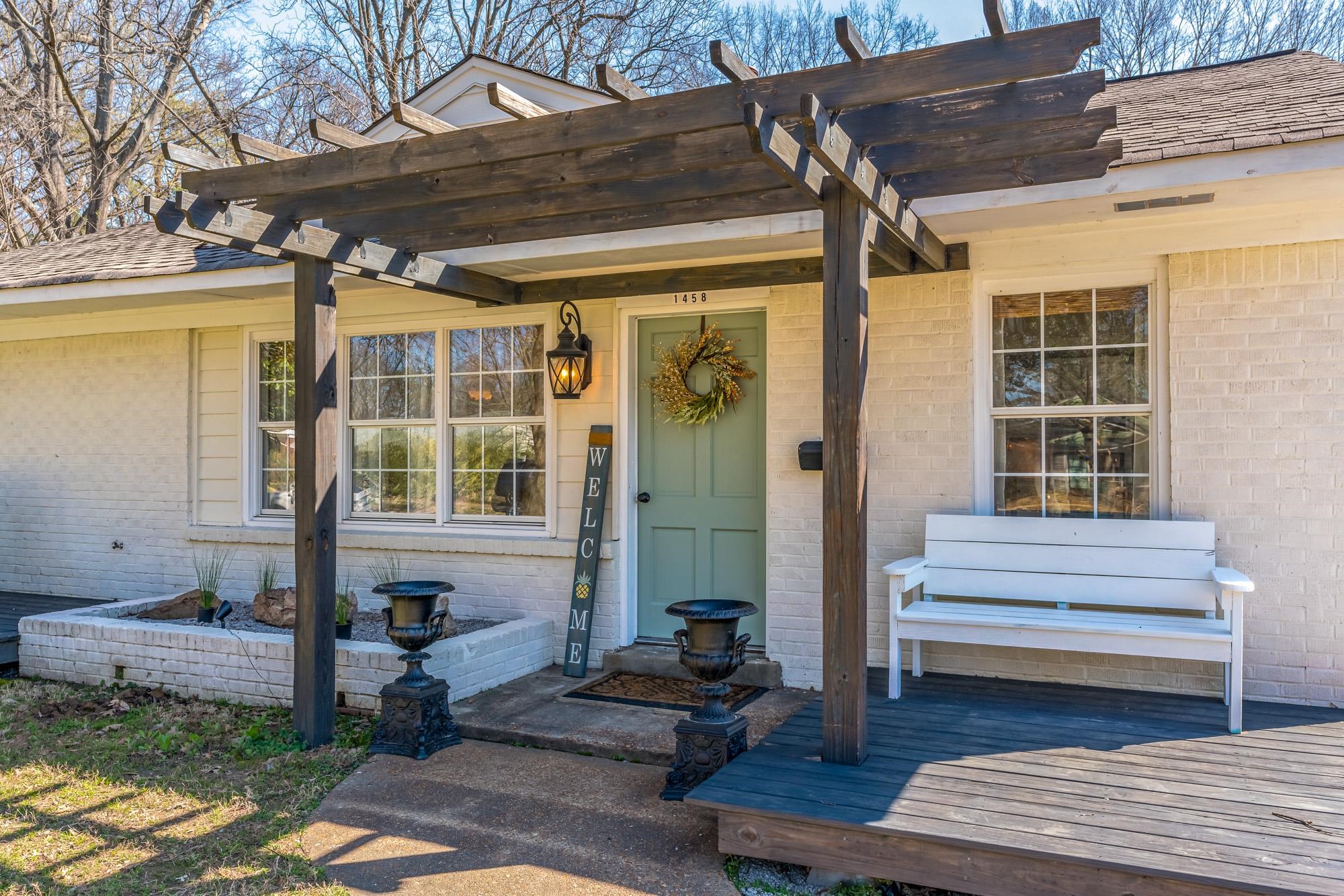 1458 Marcia Road Memphis, TN 38117 - Photo 3 of 25 a front view of a house with a large window
