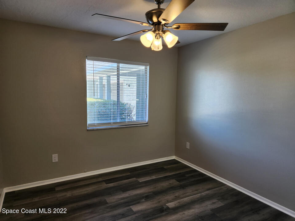 1267 Cotton Road Northeast Palm Bay, FL 32905 - Photo 21 of 30 a view of an empty room with window