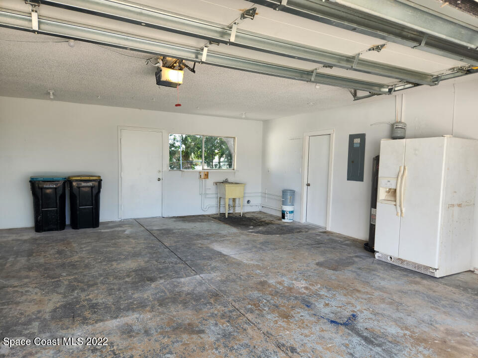 1267 Cotton Road Northeast Palm Bay, FL 32905 - Photo 25 of 30 a view of a garage