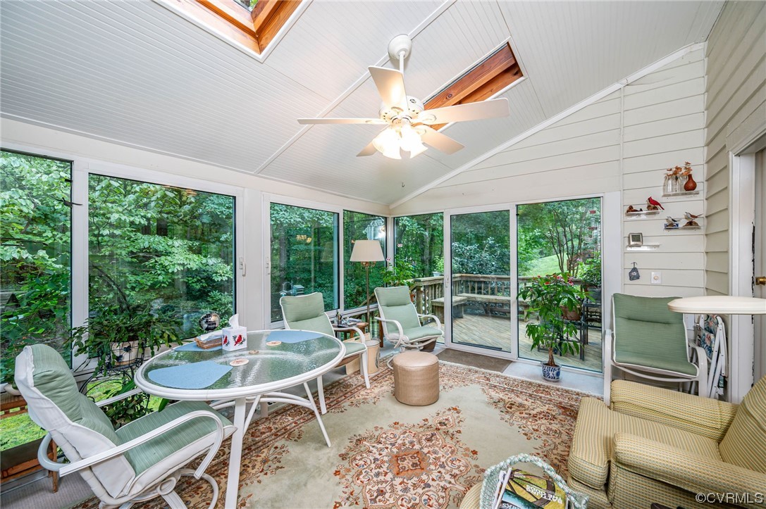 1719 Foxfire Circle Henrico, VA 23238 - Photo 15 of 24 a dining room with furniture a flat screen tv and a large window