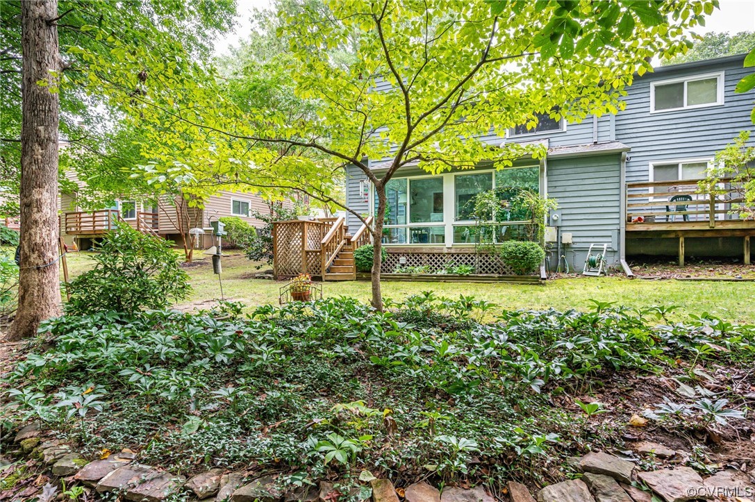 1719 Foxfire Circle Henrico, VA 23238 - Photo 22 of 24 a view of a chair and table in backyard of the house