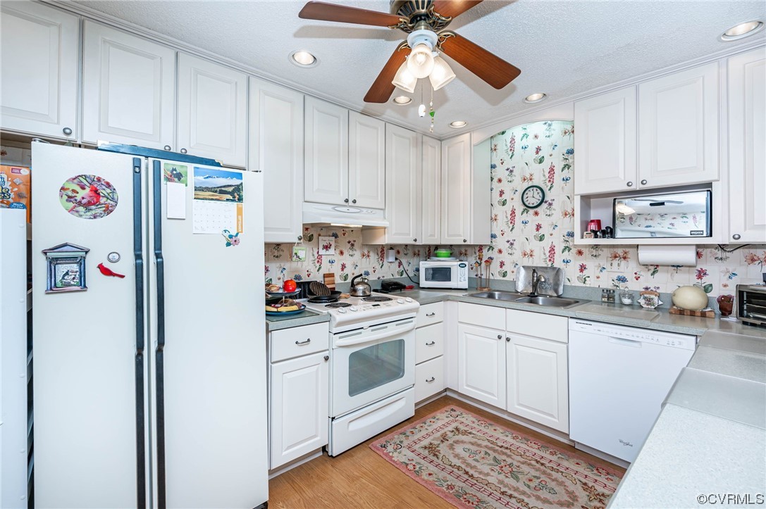 1719 Foxfire Circle Henrico, VA 23238 - Photo 5 of 24 a white refrigerator freezer sitting inside of a kitchen