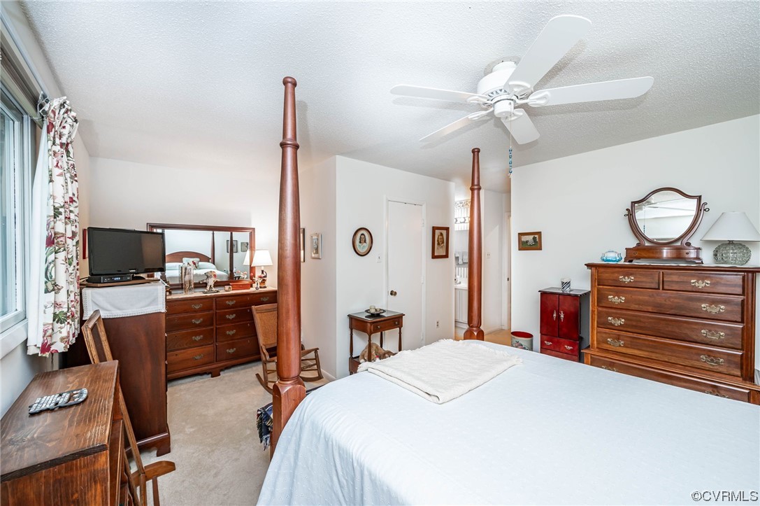 1719 Foxfire Circle Henrico, VA 23238 - Photo 10 of 24 a bedroom with a bed and wooden floor