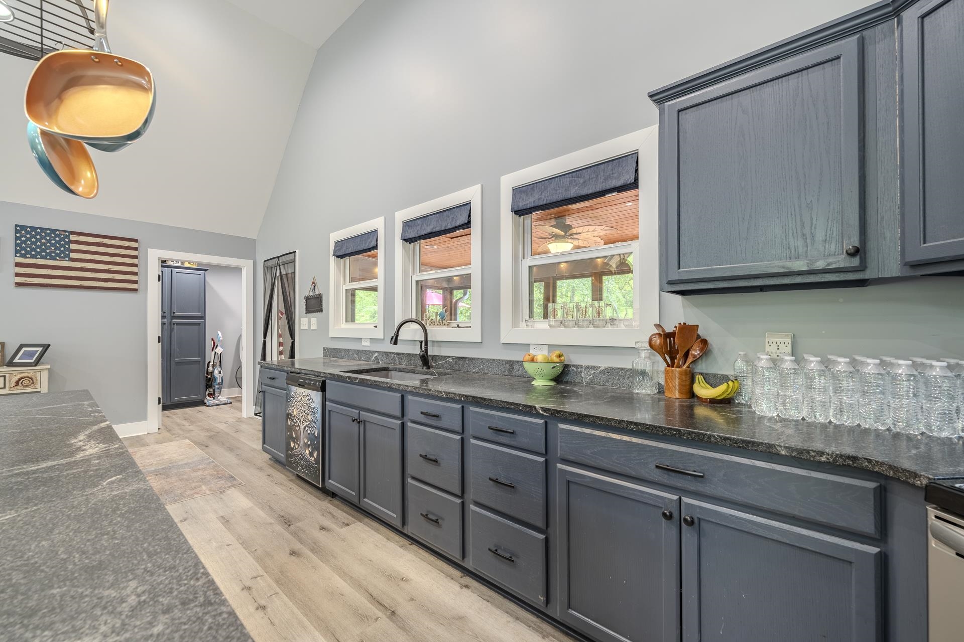 315 Timber Ridge Drive Counce, TN 38326 - Photo 12 of 40 a kitchen with sink cabinets and window
