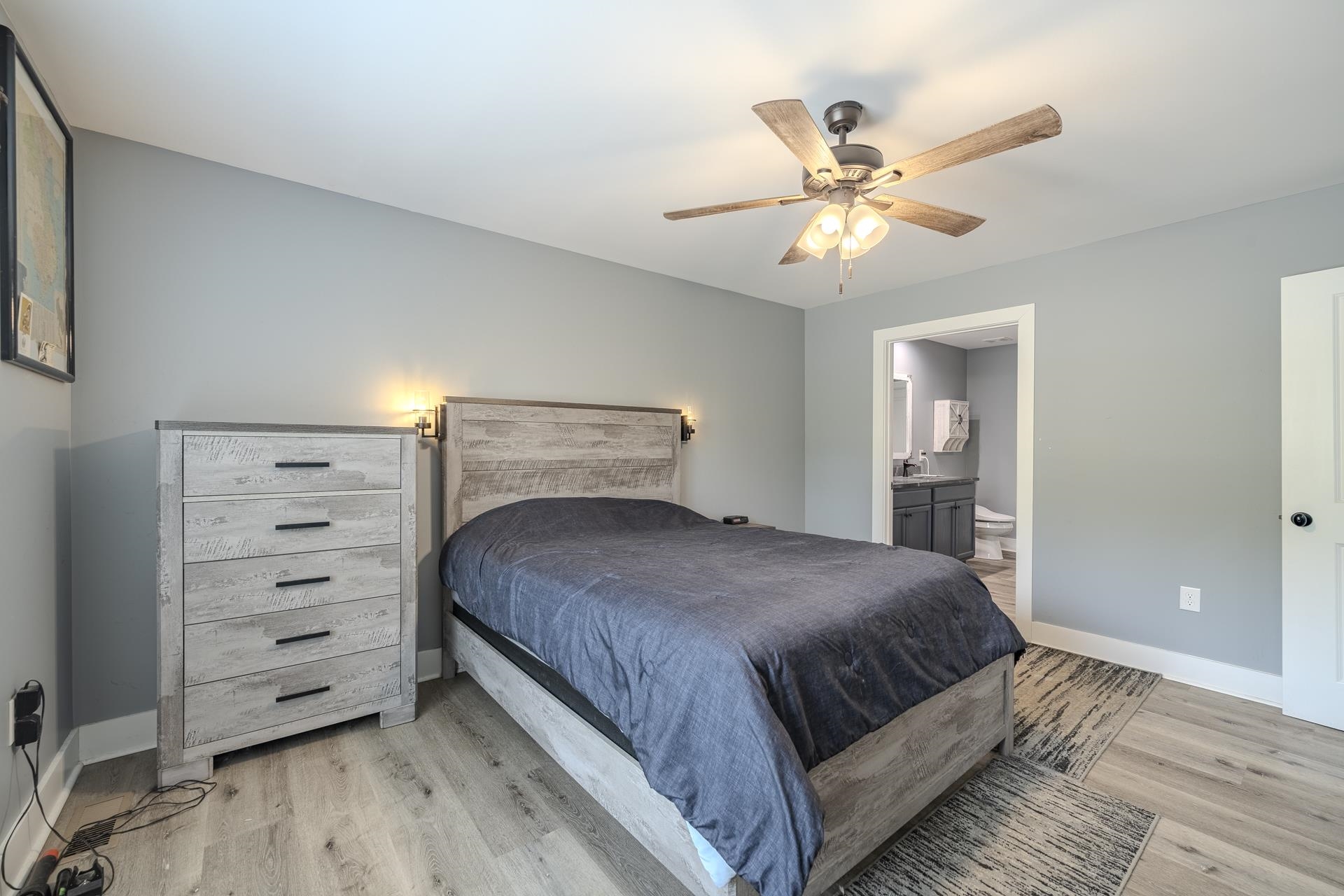 315 Timber Ridge Drive Counce, TN 38326 - Photo 21 of 40 a bedroom with a bed and a ceiling fan