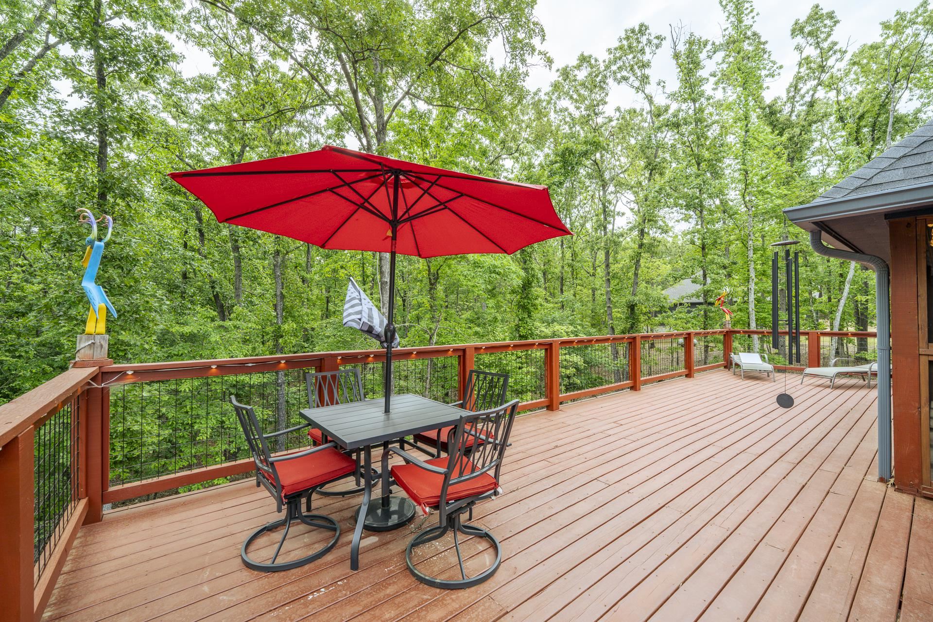 315 Timber Ridge Drive Counce, TN 38326 - Photo 28 of 40 a view of balcony with wooden floor and outdoor seating