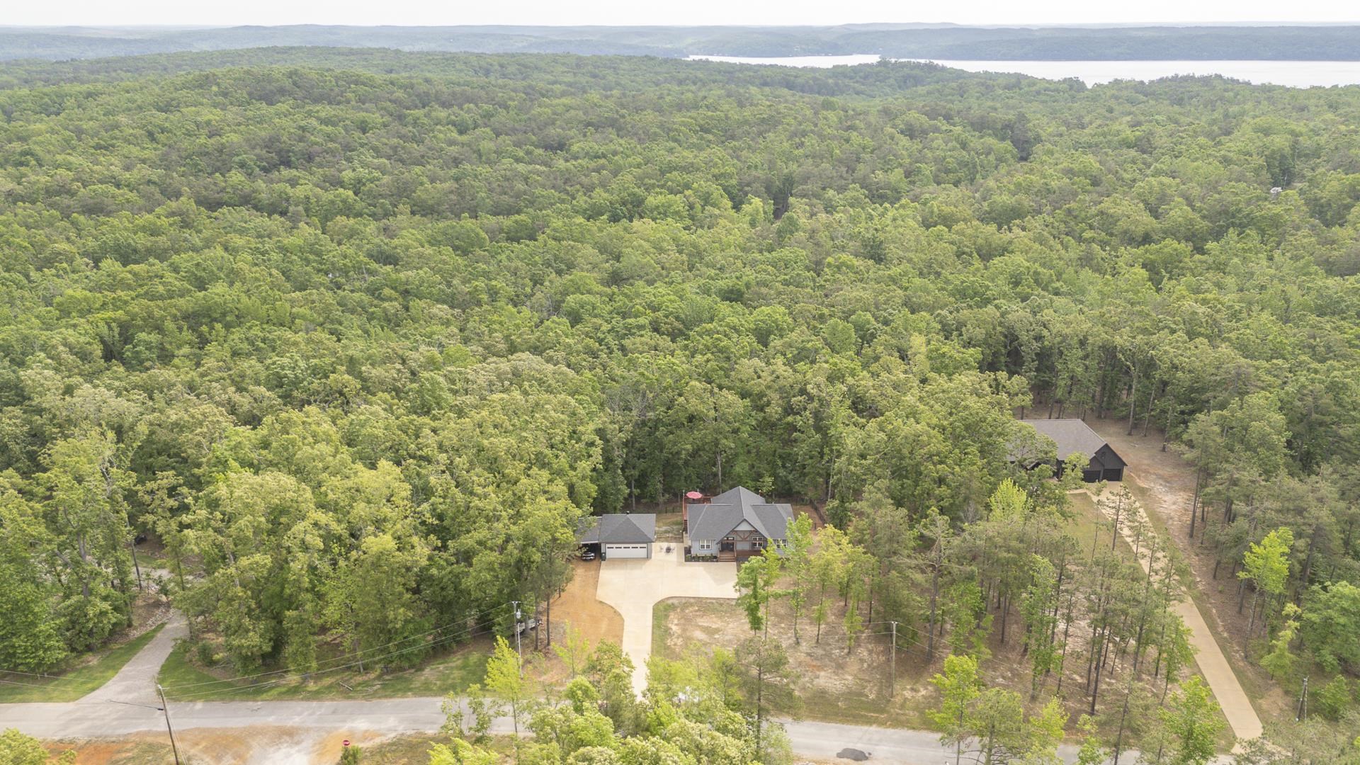 315 Timber Ridge Drive Counce, TN 38326 - Photo 35 of 40 a view of a city with lush green forest