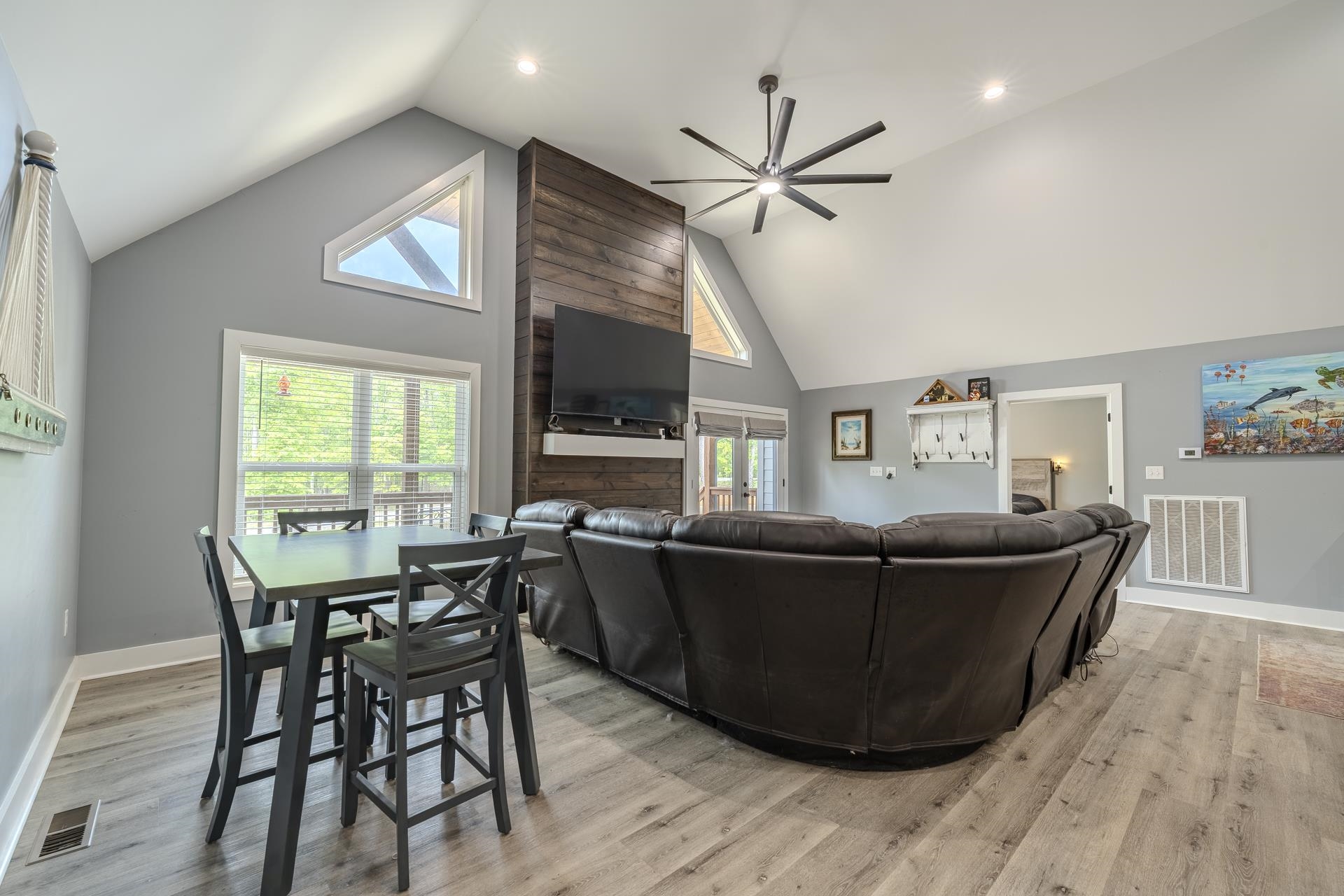 315 Timber Ridge Drive Counce, TN 38326 - Photo 6 of 40 a living room with a dining table and a wooden floor