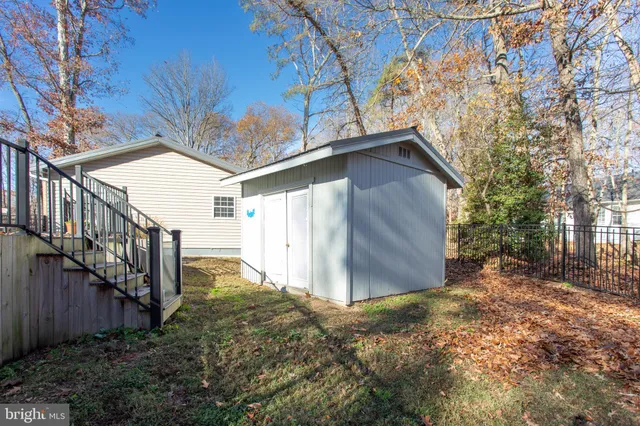 a view of a backyard of the house
