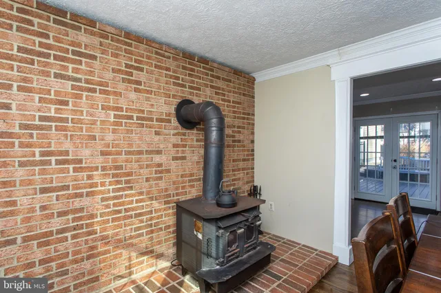 a view of a hallway with a wooden floor