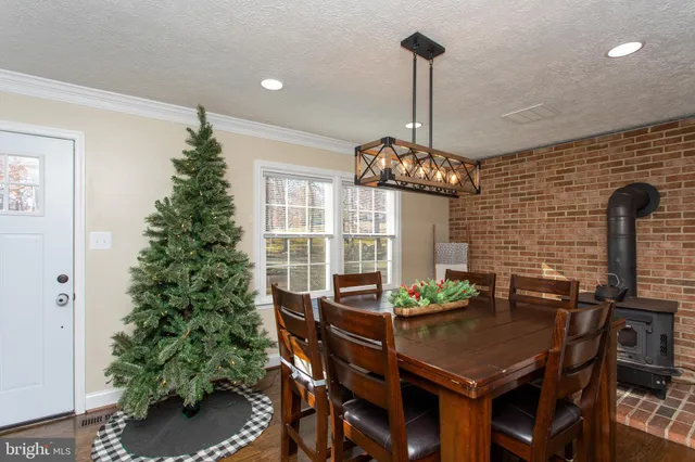 a bathroom with a bathtub and a double vanity sink