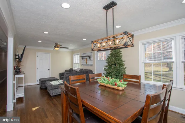 a bathroom with a bathtub and a window