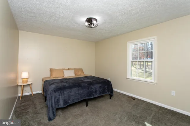 a view of a workspace with furniture
