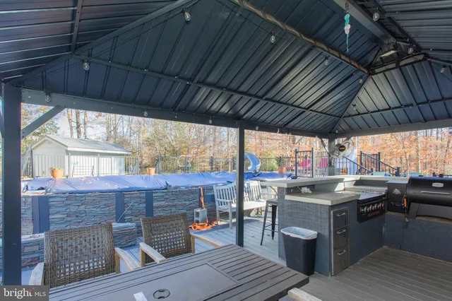 a view of a back yard of the house