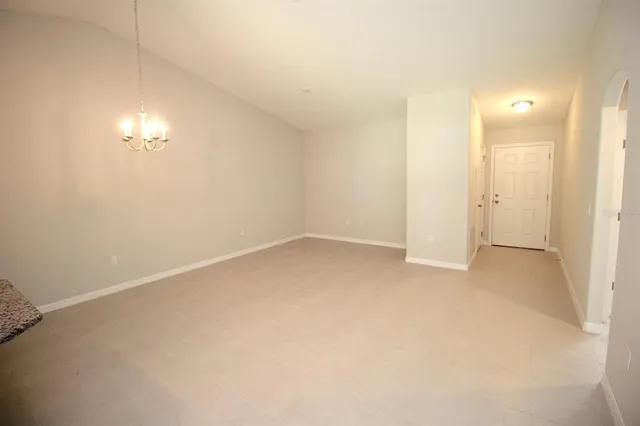 a view of a room with a large window