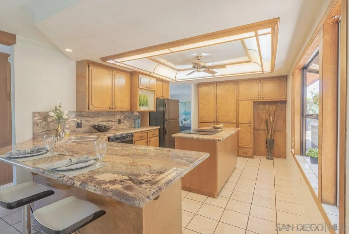 2328 Grace Lane Alpine, CA 91901 - Photo 11 of 27 a kitchen with stainless steel appliances granite countertop a sink and cabinets
