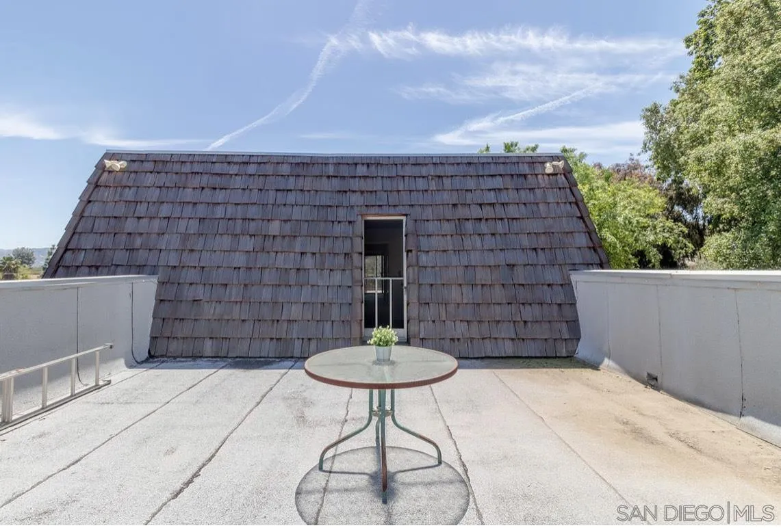 2328 Grace Lane Alpine, CA 91901 - Photo 24 of 27 a backyard of a house with table and chairs