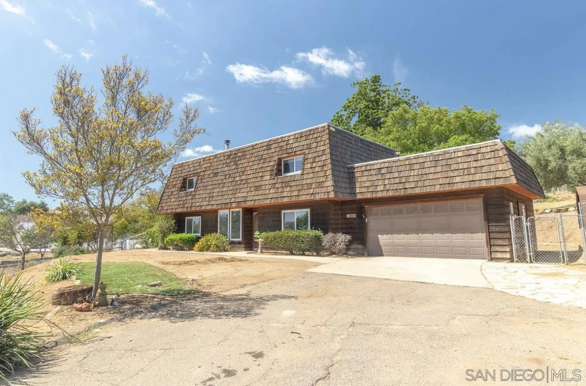 2328 Grace Lane Alpine, CA 91901 - Photo 3 of 27 a front view of a house with a yard