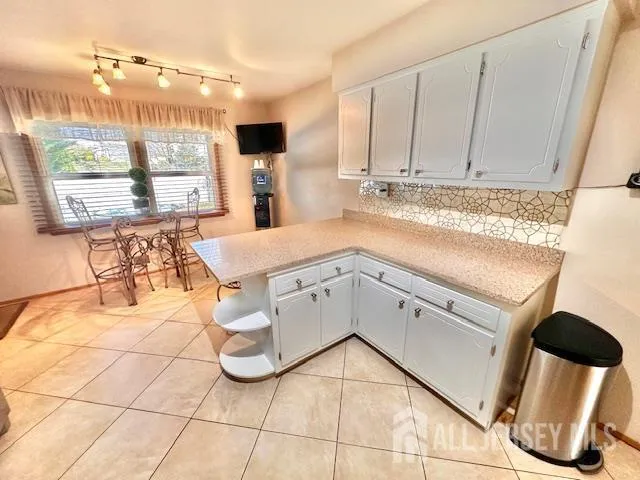 a view of a room with windows