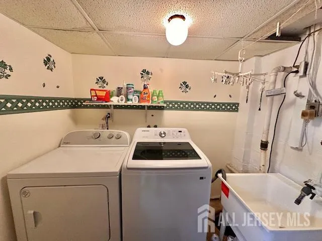 a view of a patio with table and chairs