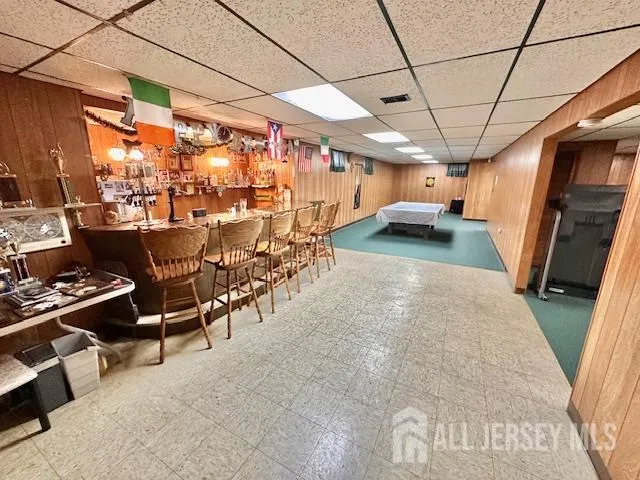 a spacious bedroom with a bed and a window