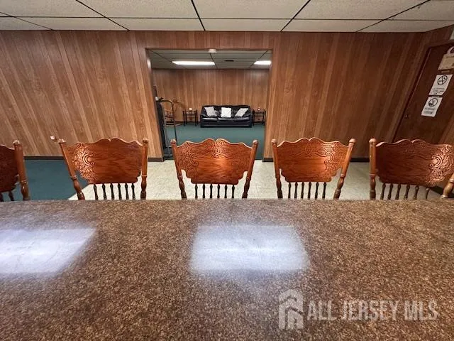 a bed room with a bed and a chair