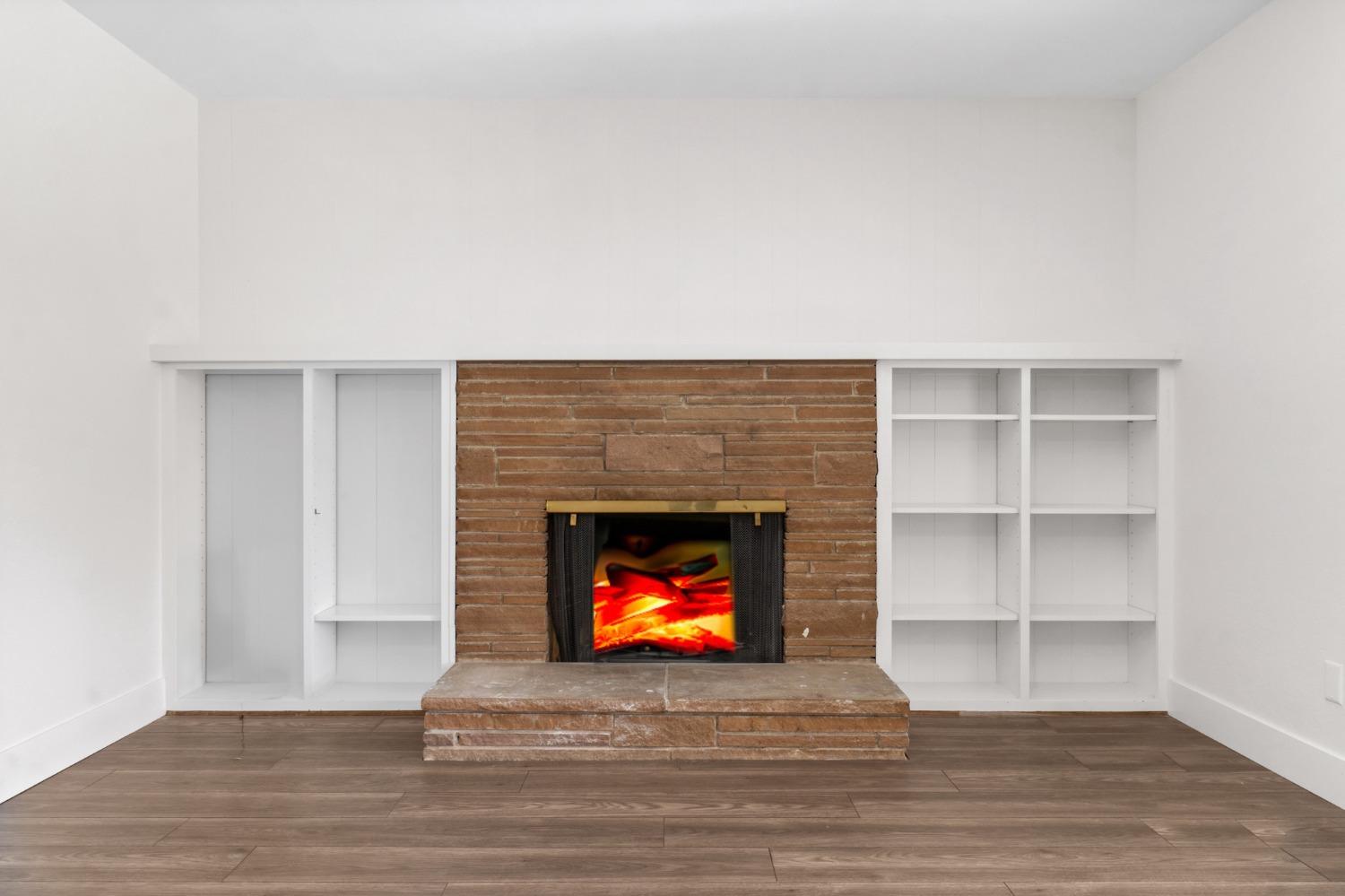 725 West Rialto Avenue Fresno, CA 93705 - Photo 13 of 25 a living room with a fireplace