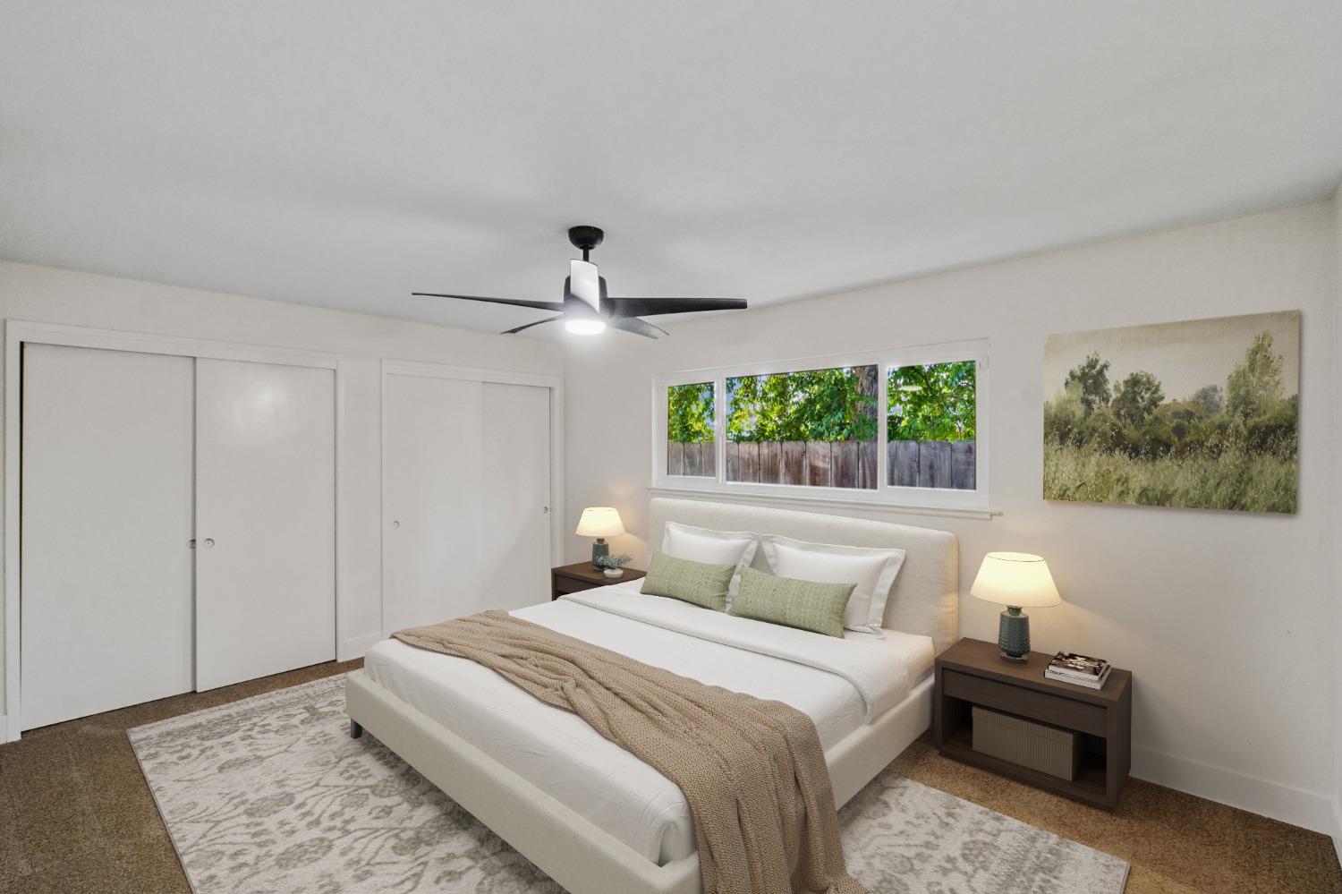 725 West Rialto Avenue Fresno, CA 93705 - Photo 17 of 25 a bedroom with a bed and a painting on the wall