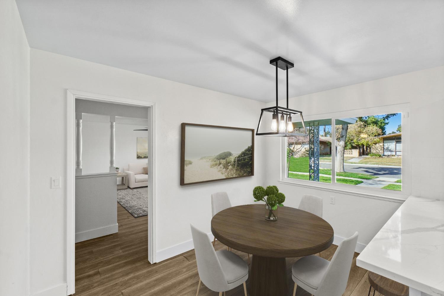 725 West Rialto Avenue Fresno, CA 93705 - Photo 5 of 25 a dining room with furniture and window