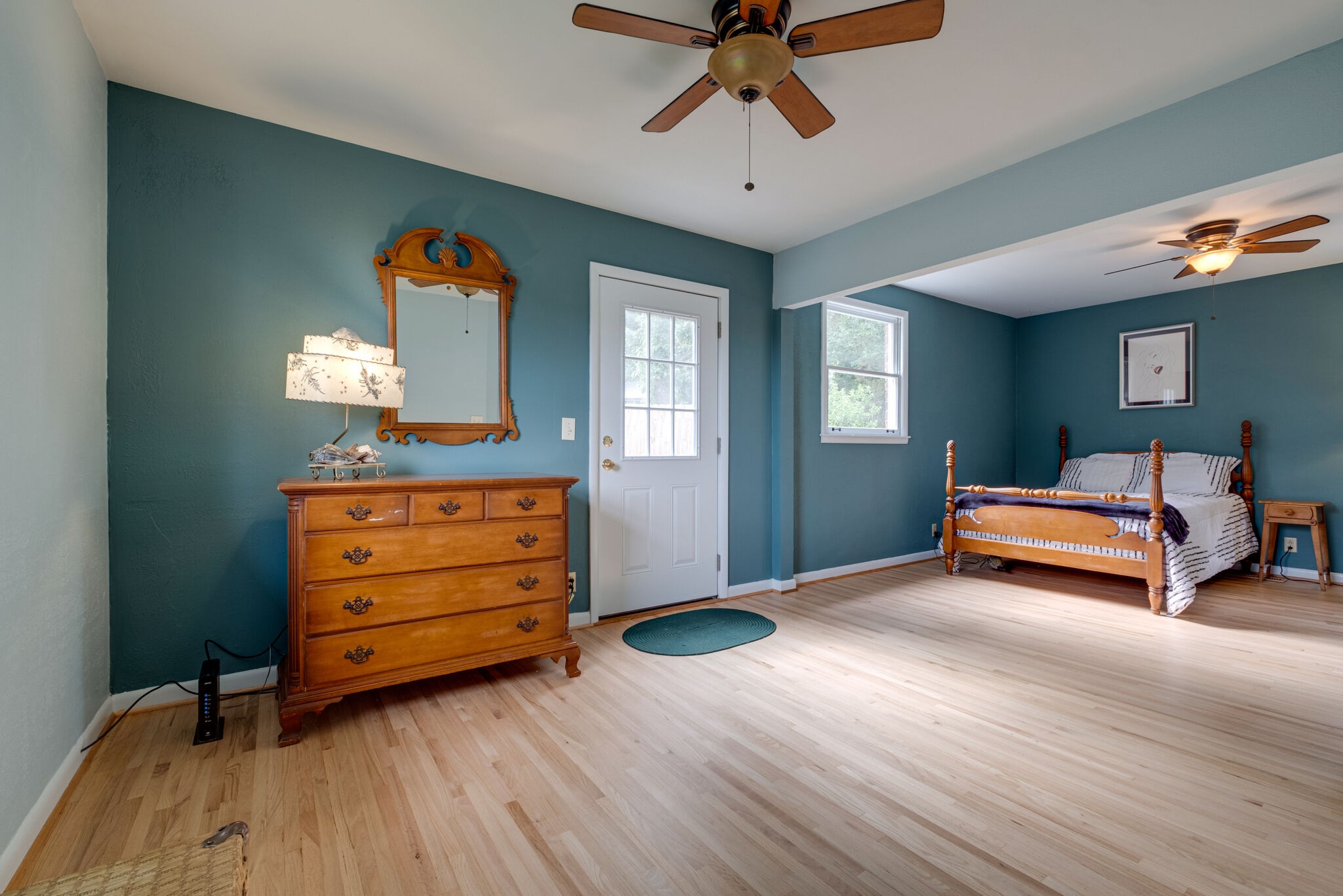 3021 Anderson Road Nashville, TN 37217 - Photo 14 of 27 a bedroom with a bed and a chandelier