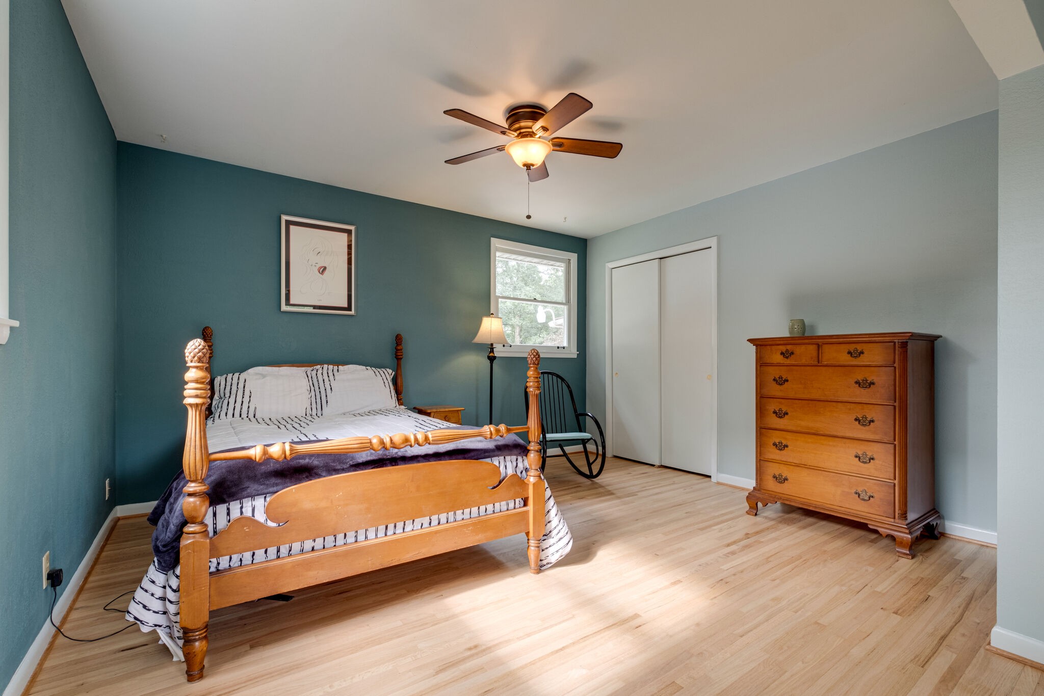 3021 Anderson Road Nashville, TN 37217 - Photo 15 of 27 a bedroom with a bed and a chandelier