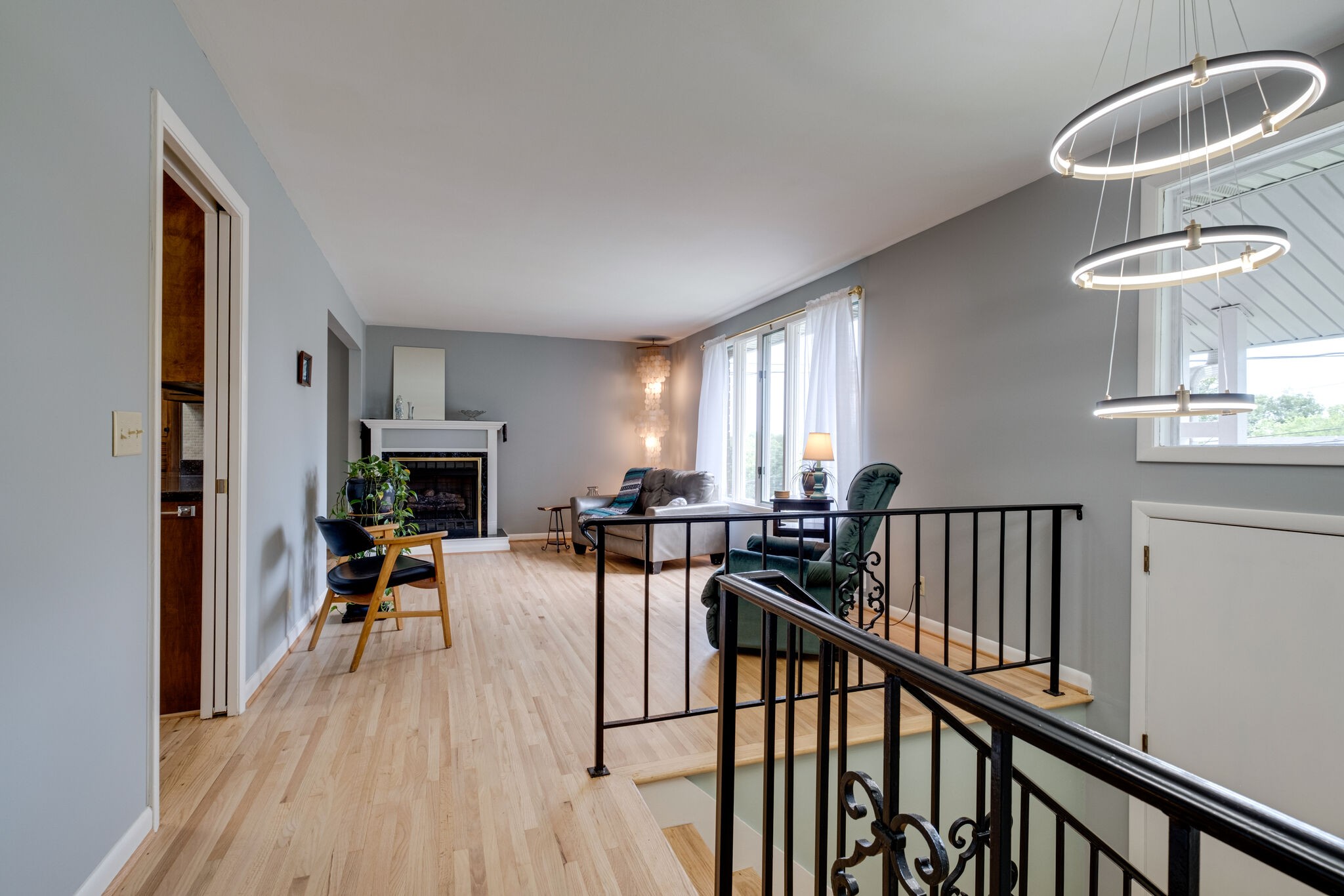 3021 Anderson Road Nashville, TN 37217 - Photo 6 of 27 a view of a livingroom with furniture hardwood floor and staircase