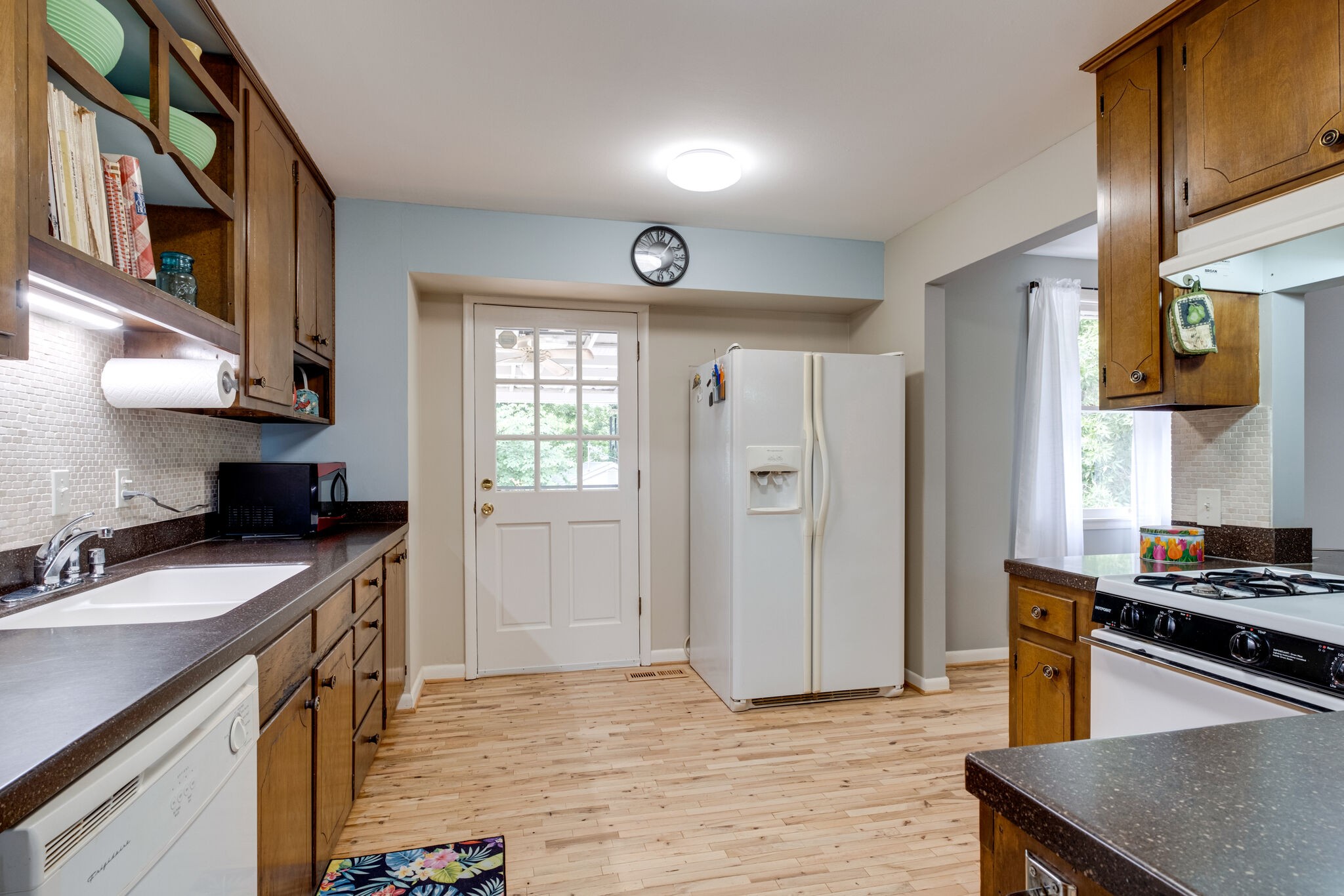 3021 Anderson Road Nashville, TN 37217 - Photo 10 of 27 a kitchen with a sink stove and cabinets