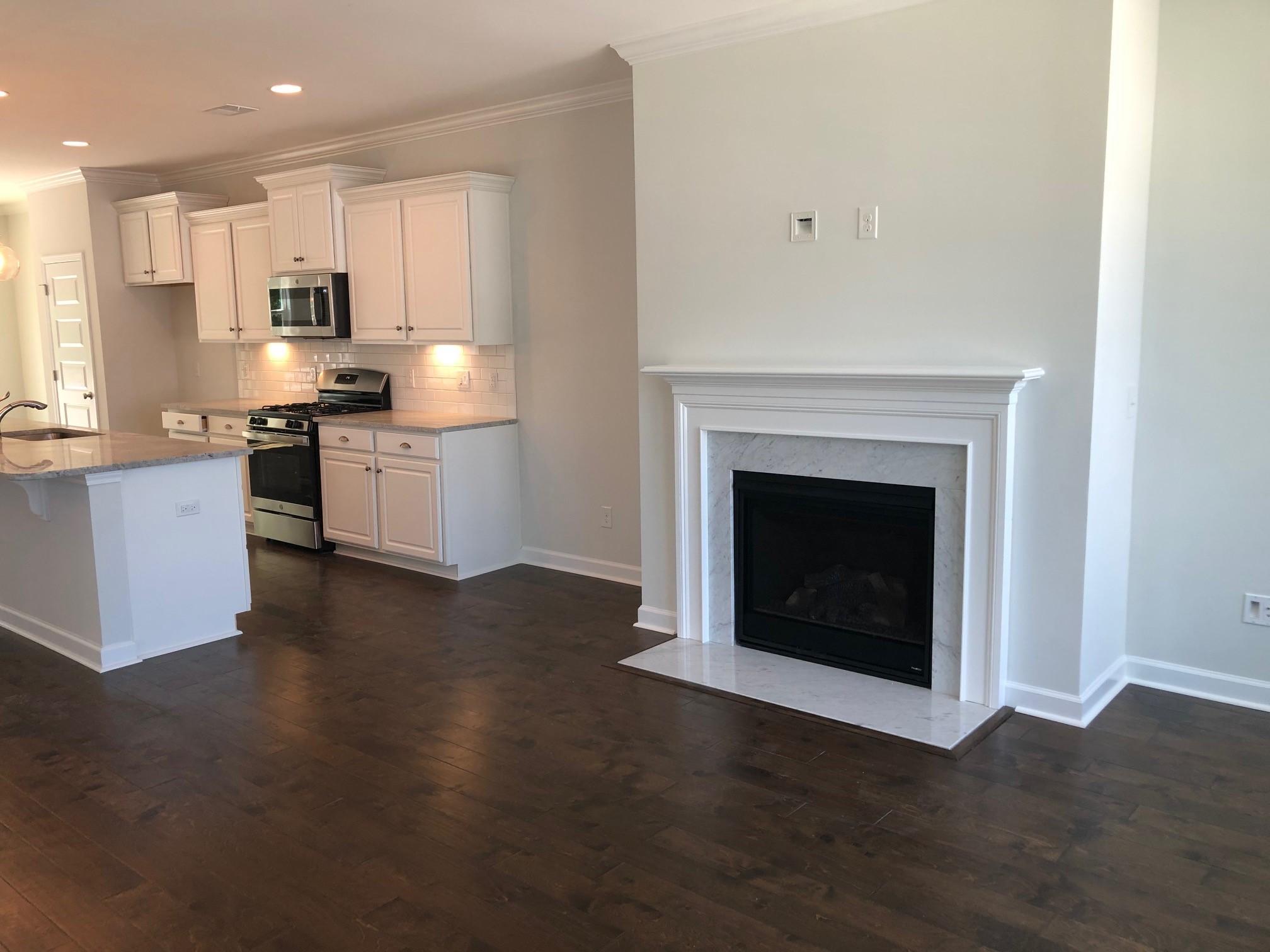 1554 Moss Spring Road Mount Pleasant, SC 29466 - Photo 2 of 12 fireplace with marble surround