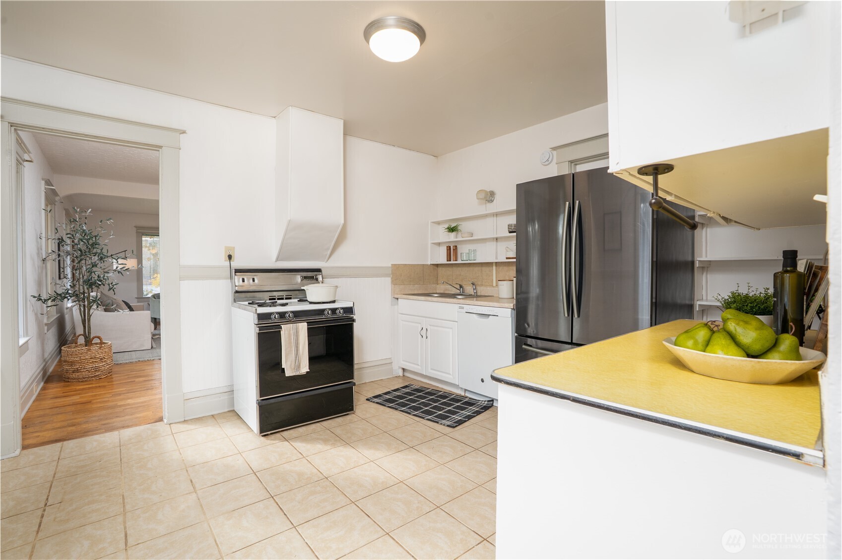 205 Brandywine Avenue DuPont, WA 98327 - Photo 15 of 38 a kitchen with a refrigerator sink and cabinets