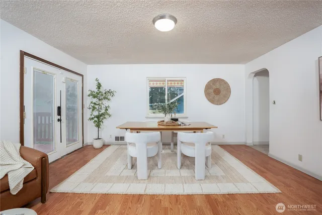 a living room with furniture and window