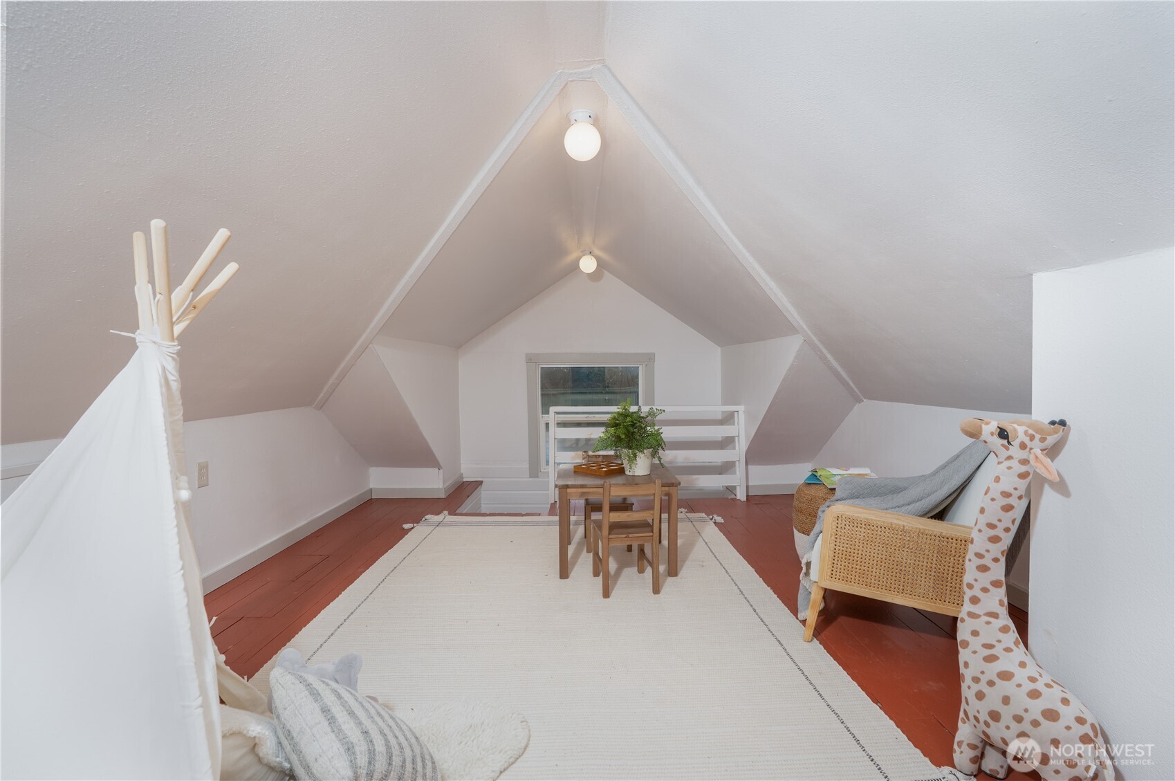 205 Brandywine Avenue DuPont, WA 98327 - Photo 25 of 38 a living room with furniture and a fireplace