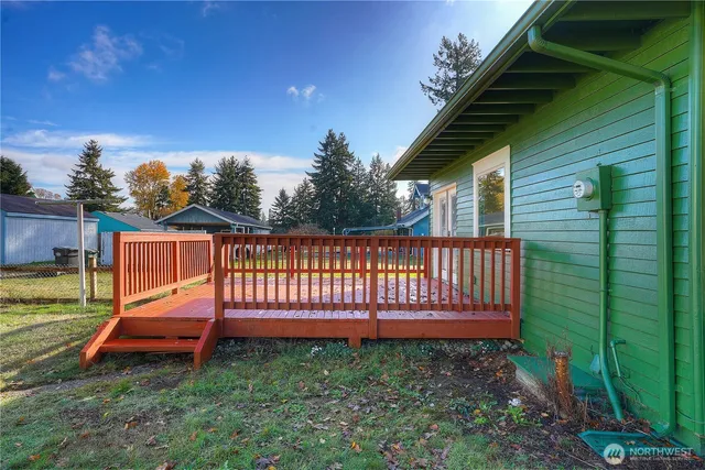 a view of a backyard with a small garden