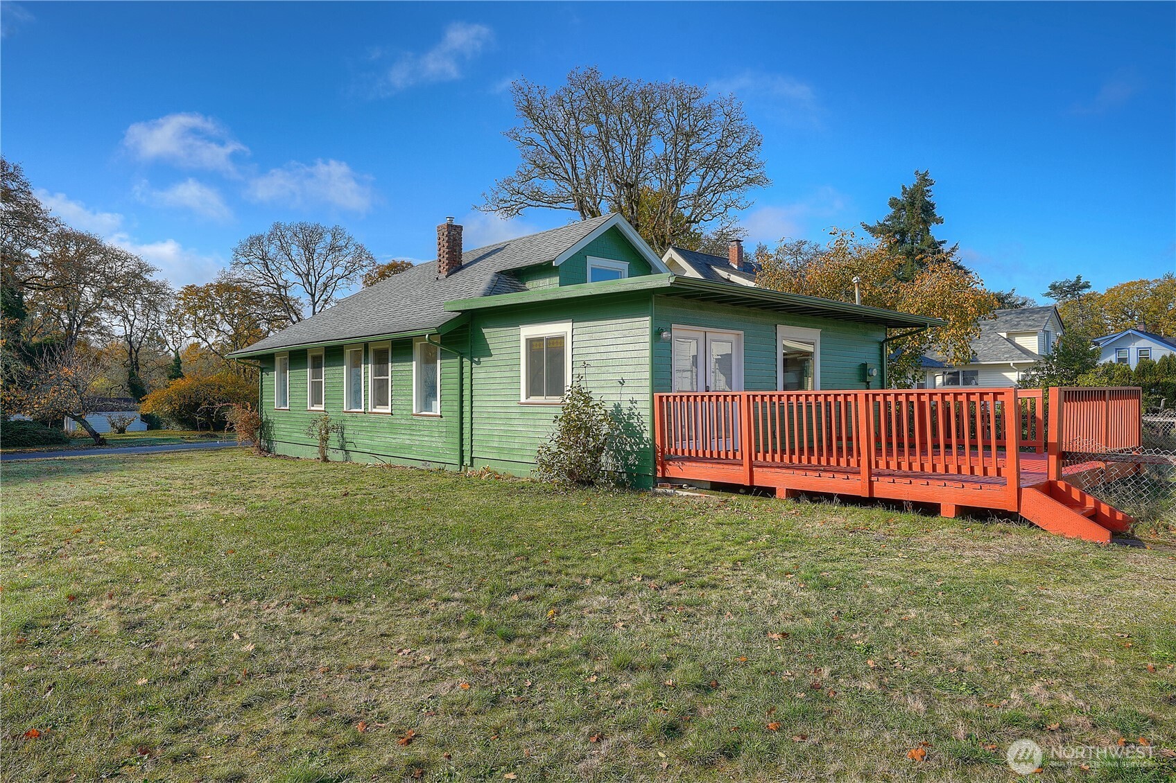 205 Brandywine Avenue DuPont, WA 98327 - Photo 32 of 38 a view of a house with a yard and deck