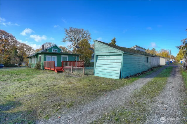 a view of backyard with green space
