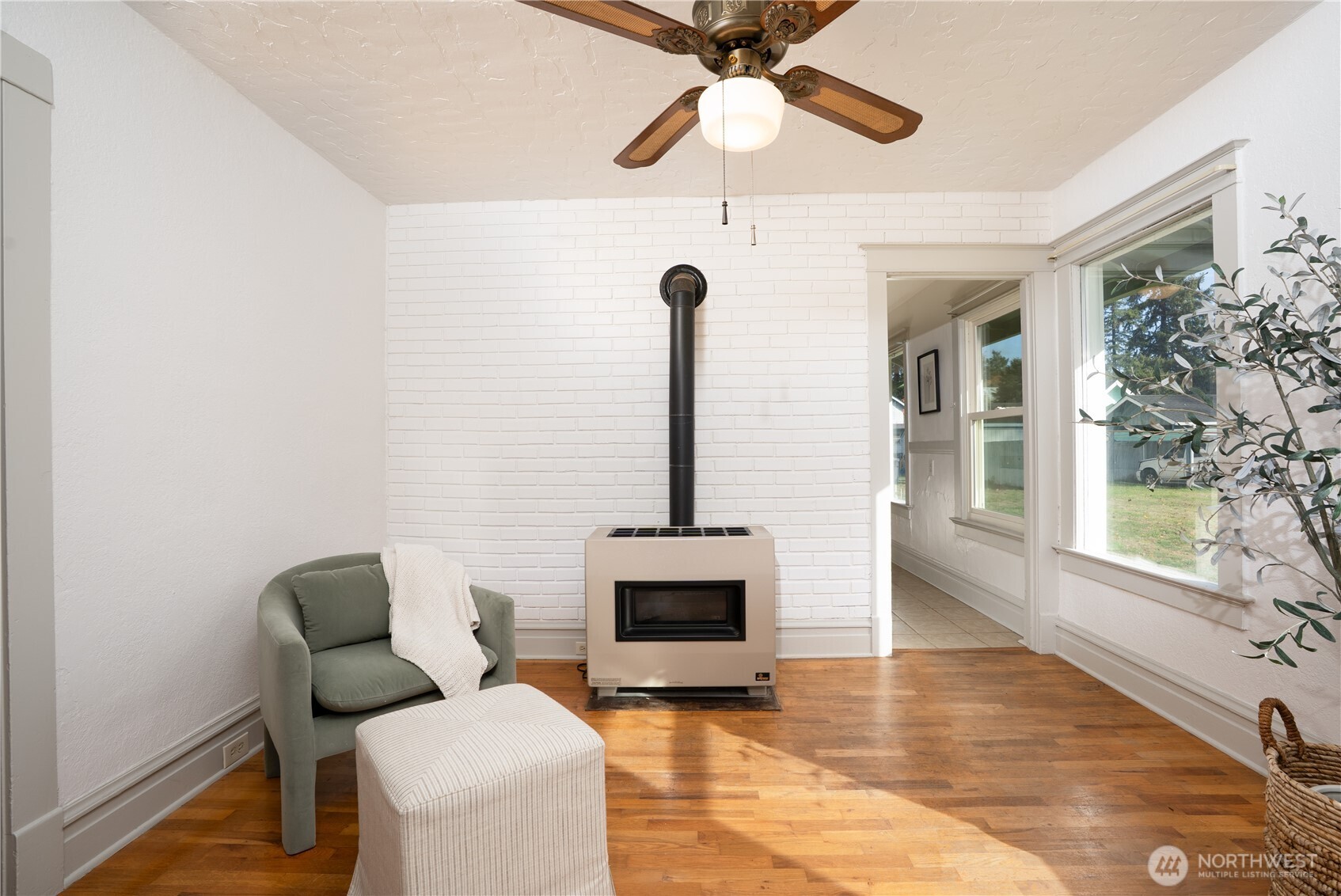 205 Brandywine Avenue DuPont, WA 98327 - Photo 7 of 38 a living room with furniture and a fireplace