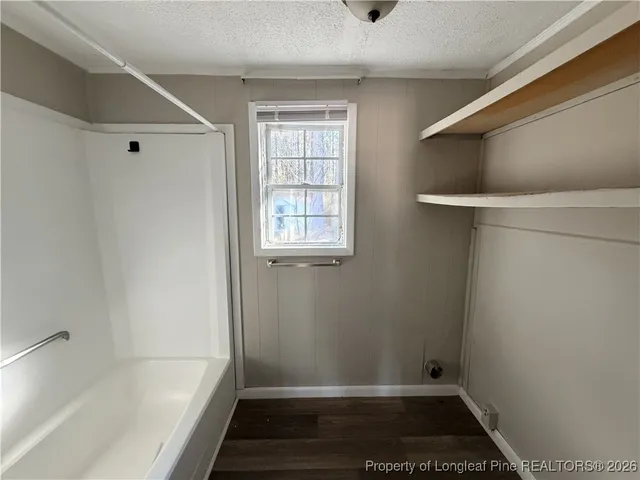 a bathroom with a bathtub