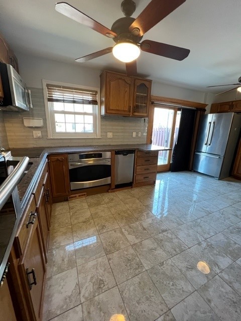 2156 Rugen Road, Unit D Glenview, IL 60026 - Photo 5 of 15 a large kitchen with a stove and cabinets