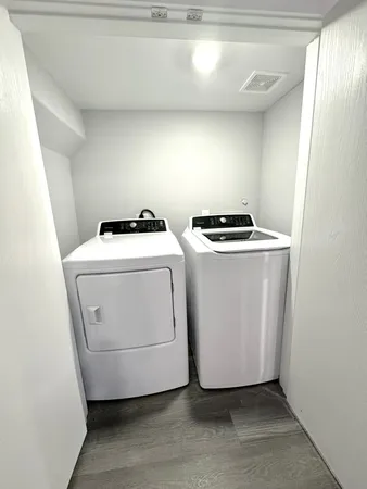 a utility room with dryer and washer
